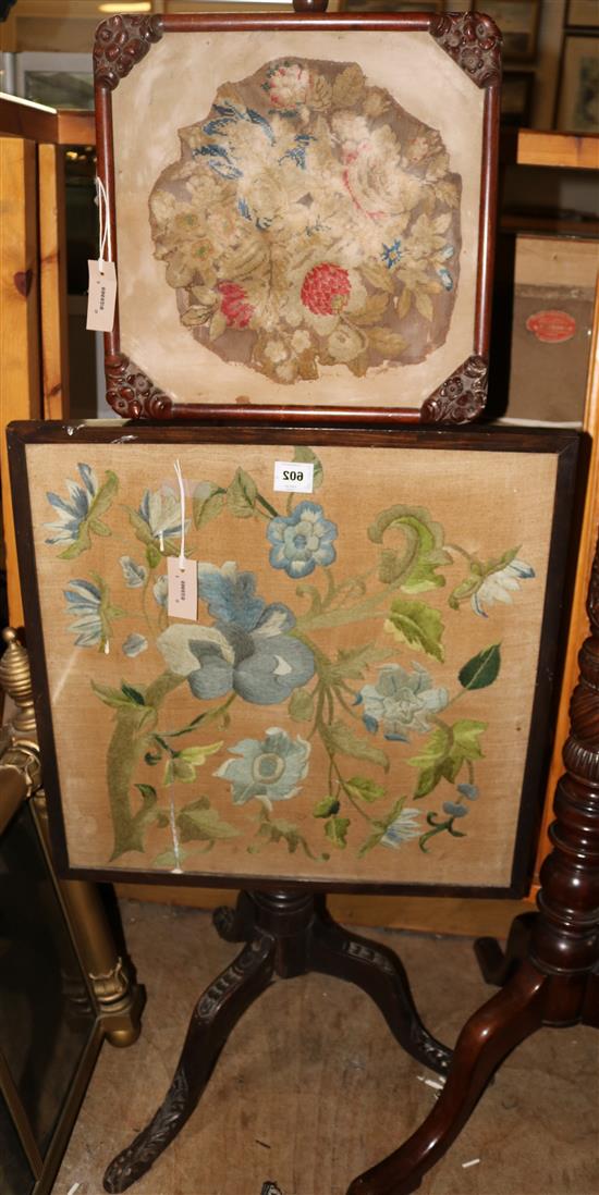 Victorian mahogany pole screen, with needlework panel and acanthus carved tripartite base & another floral-carved screen(-)